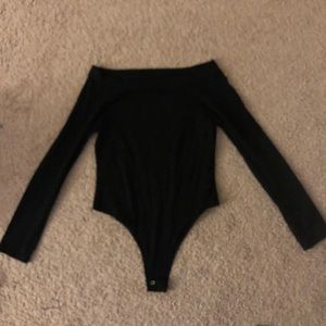 black shoulderless body suit